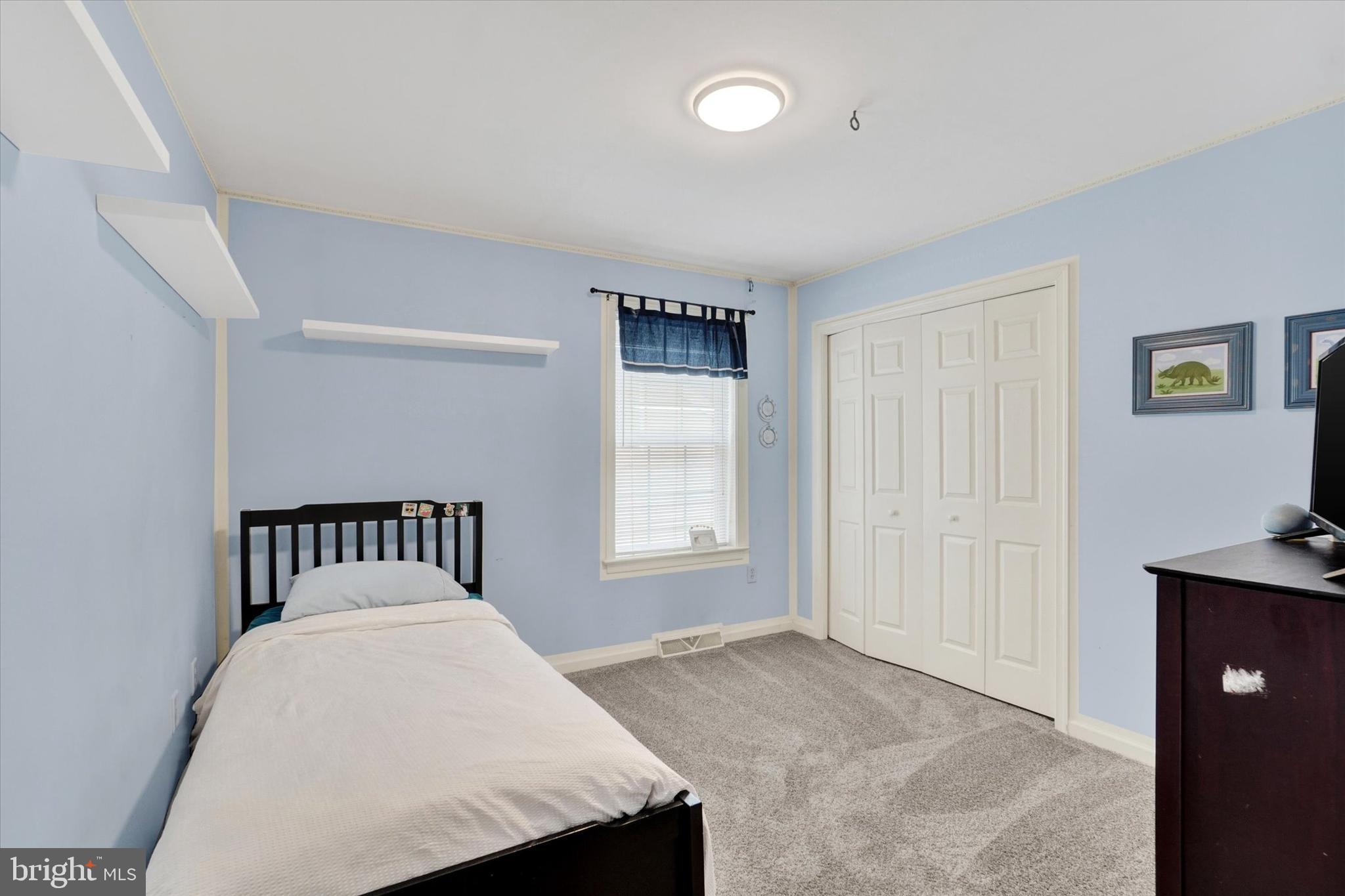 445 Stabley Lane Windsor, PA 17366 - Photo 20 of 26 a bedroom with a bed and window