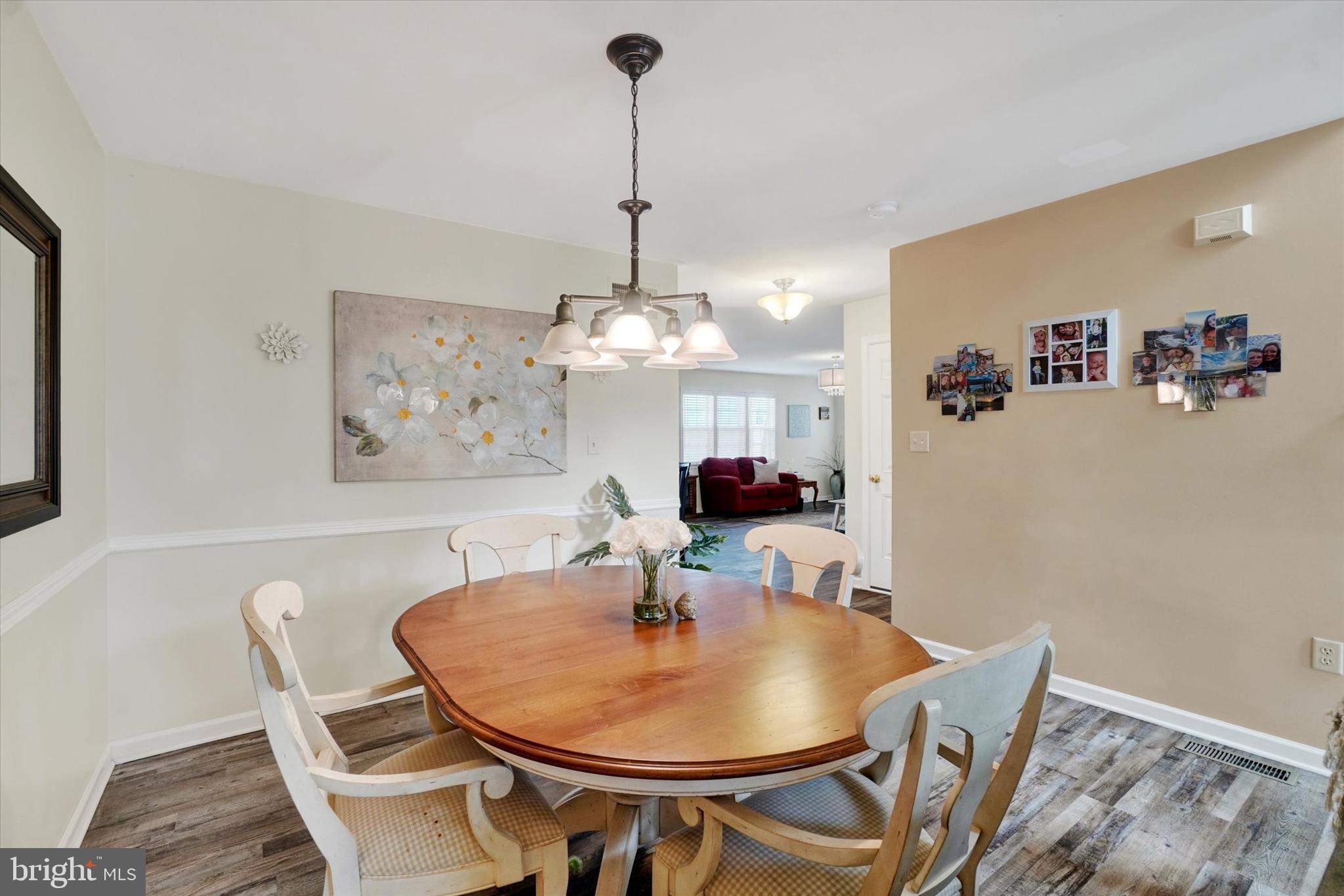 445 Stabley Lane Windsor, PA 17366 - Photo 5 of 26 a view of a dining room with furniture and wooden floor