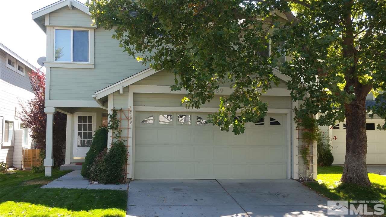7589 Lighthouse Lane Reno, NV 89511 - Photo 1 of 1 a view of a small yard in front of a house