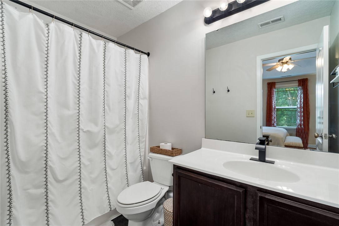 108 Belspring Lane Anderson, SC 29621 - Photo 12 of 19 This bright bathroom features clean lines and practical fixtures for everyday comfort.