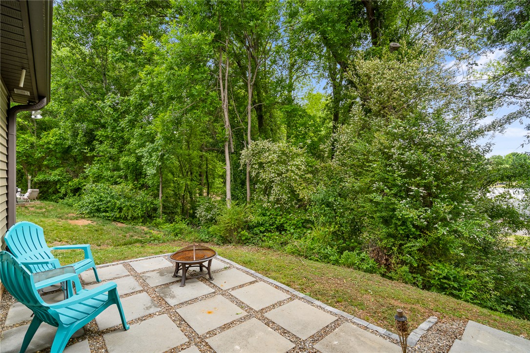 108 Belspring Lane Anderson, SC 29621 - Photo 19 of 19 Enjoy outdoor moments on this delightful patio, perfect for relaxing amidst nature.