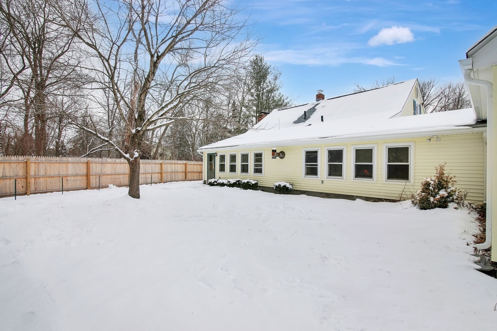 1038 Morgan Road West Springfield, MA 01089 - Photo 2 of 31 a view of a house with a yard covered in snow