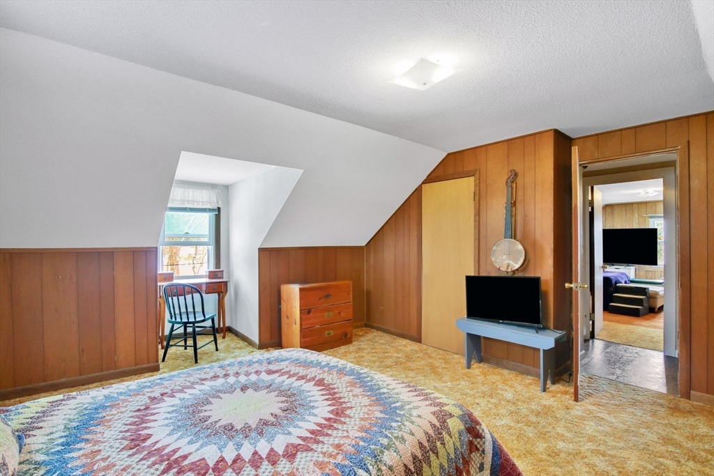 1038 Morgan Road West Springfield, MA 01089 - Photo 22 of 31 a bedroom with a bed and a television