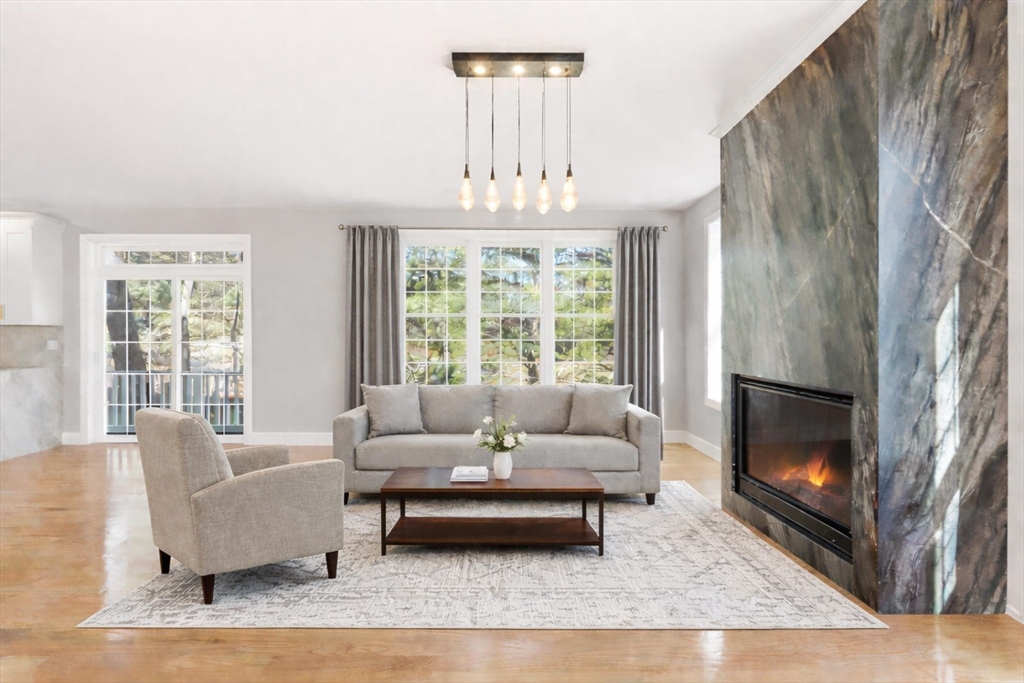 6 Barrows Road Worcester, MA 01609 - Photo 14 of 41 a living room with furniture and a fireplace