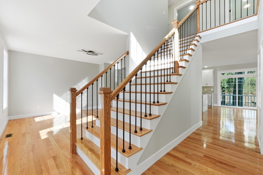 6 Barrows Road Worcester, MA 01609 - Photo 19 of 41 a view of staircase with wooden floor and white walls