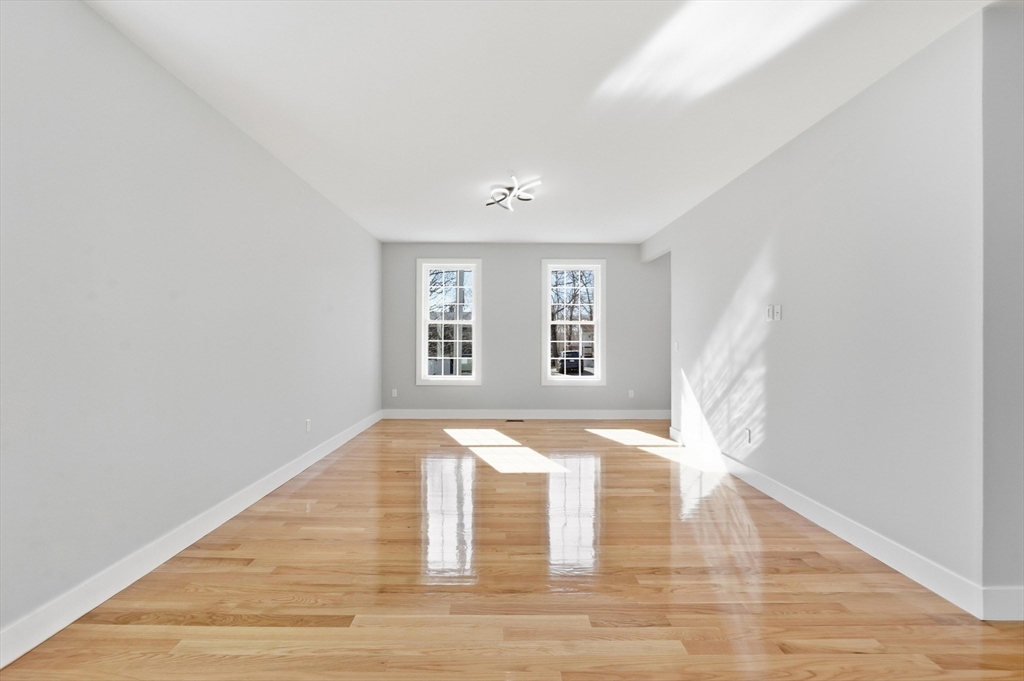 6 Barrows Road Worcester, MA 01609 - Photo 20 of 41 a view of empty room with wooden floor and fan