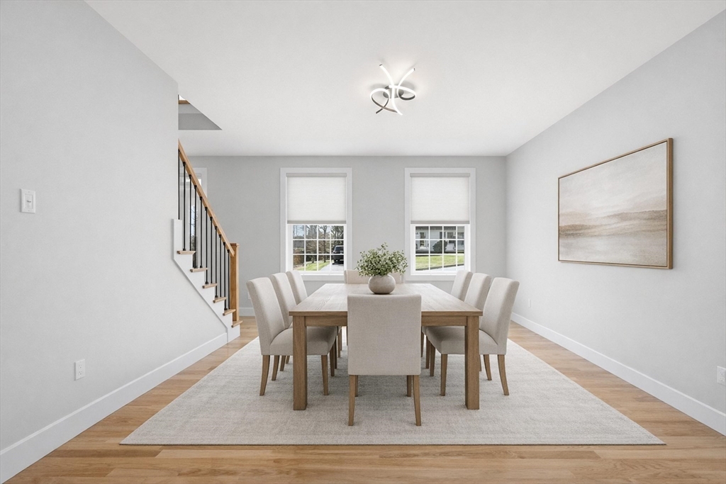 6 Barrows Road Worcester, MA 01609 - Photo 23 of 41 a view of a dining room with furniture window and wooden floor