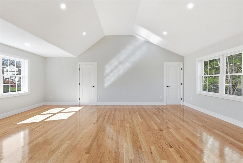 6 Barrows Road Worcester, MA 01609 - Photo 26 of 41 a view of an empty room with a window and wooden floor