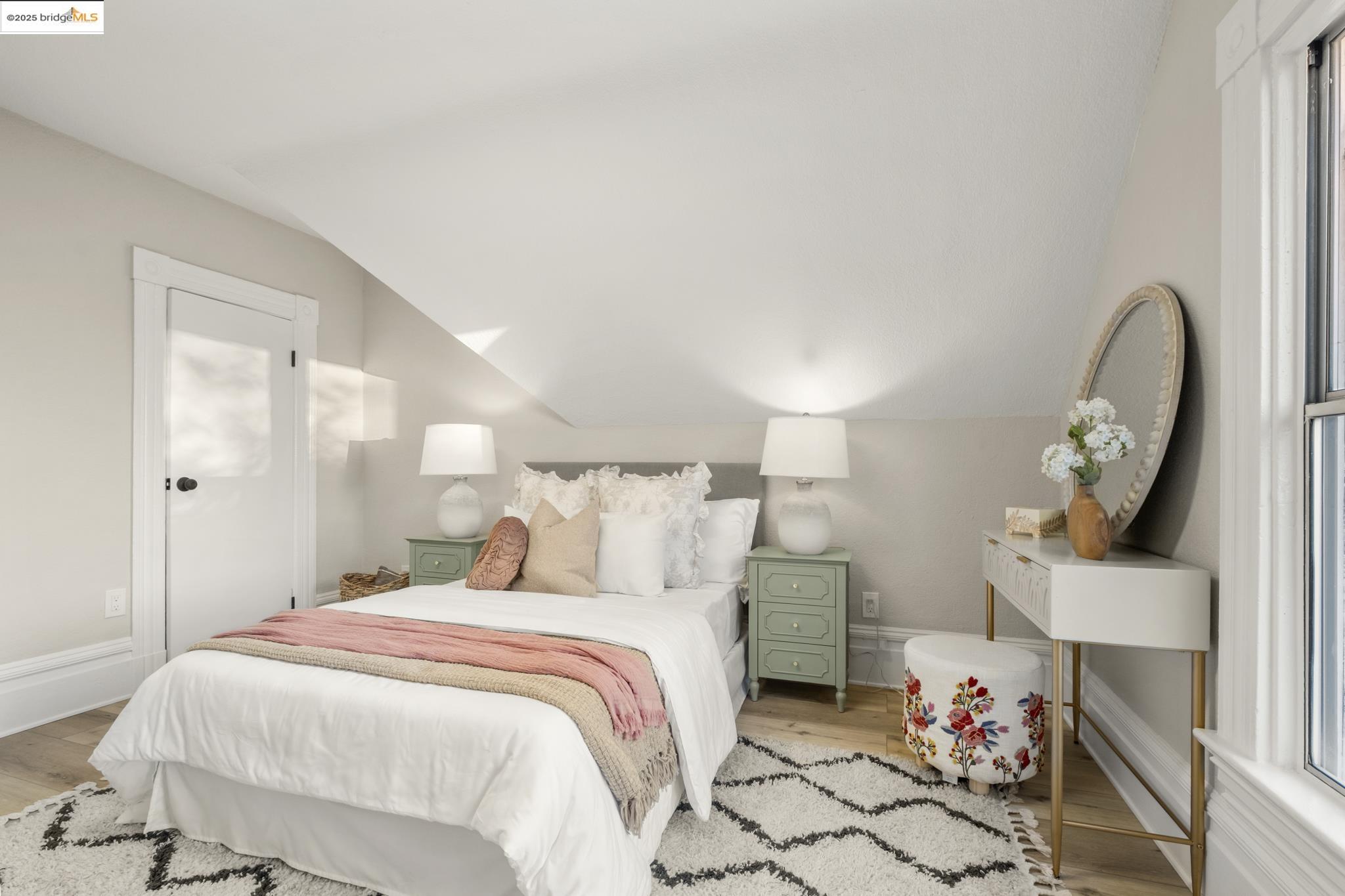 2050 East 30th Street Oakland, CA 94606 - Photo 29 of 48 Bedroom with lofted ceiling and light wood-type flooring