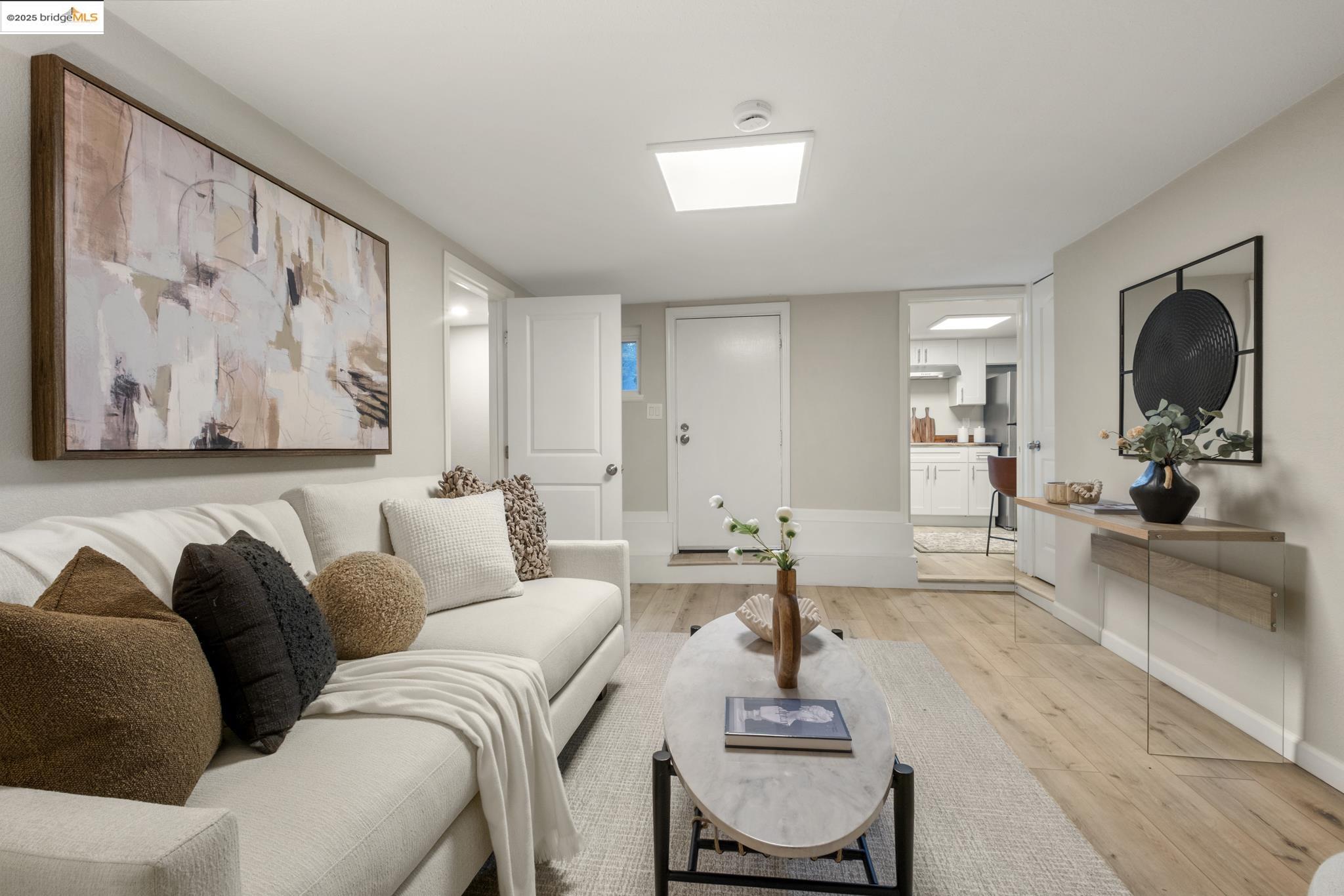 2050 East 30th Street Oakland, CA 94606 - Photo 31 of 48 Living room with light wood-type flooring