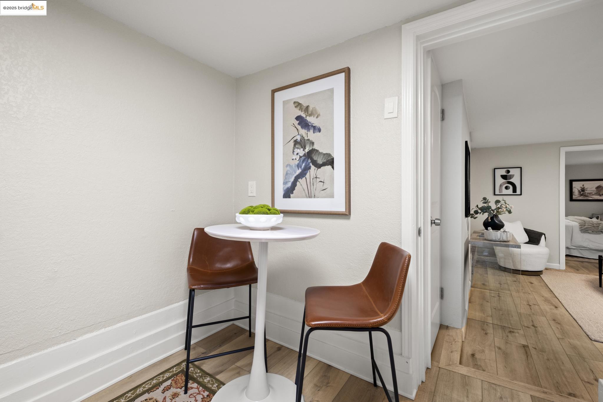 2050 East 30th Street Oakland, CA 94606 - Photo 35 of 48 Dining space with light wood-type flooring and baseboards