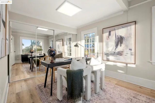 a view of a dining room with furniture window and outside view