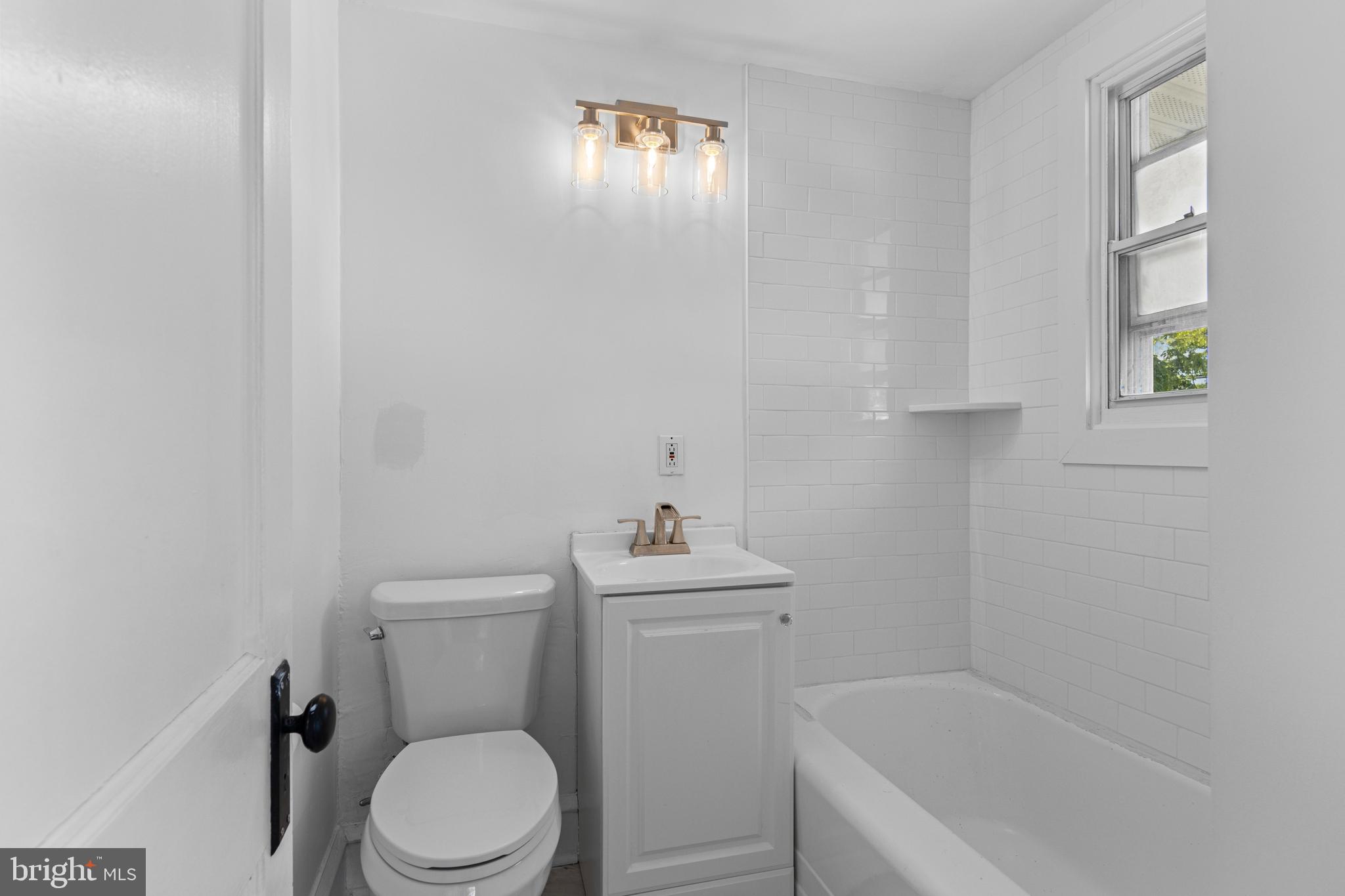 153 Conestoga Road Wayne, PA 19087 - Photo 8 of 13 a white toilet sitting next to a white sink