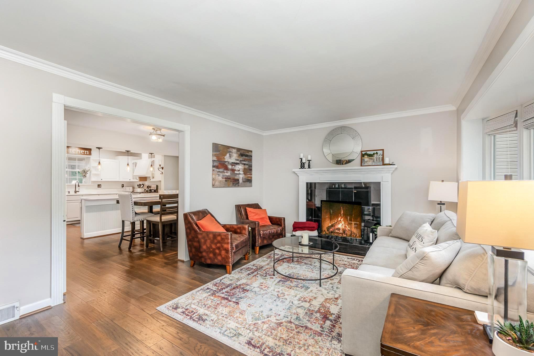 4102 Klausmier Road Baltimore, MD 21236 - Photo 2 of 37 Warm, welcoming living room with wood floors