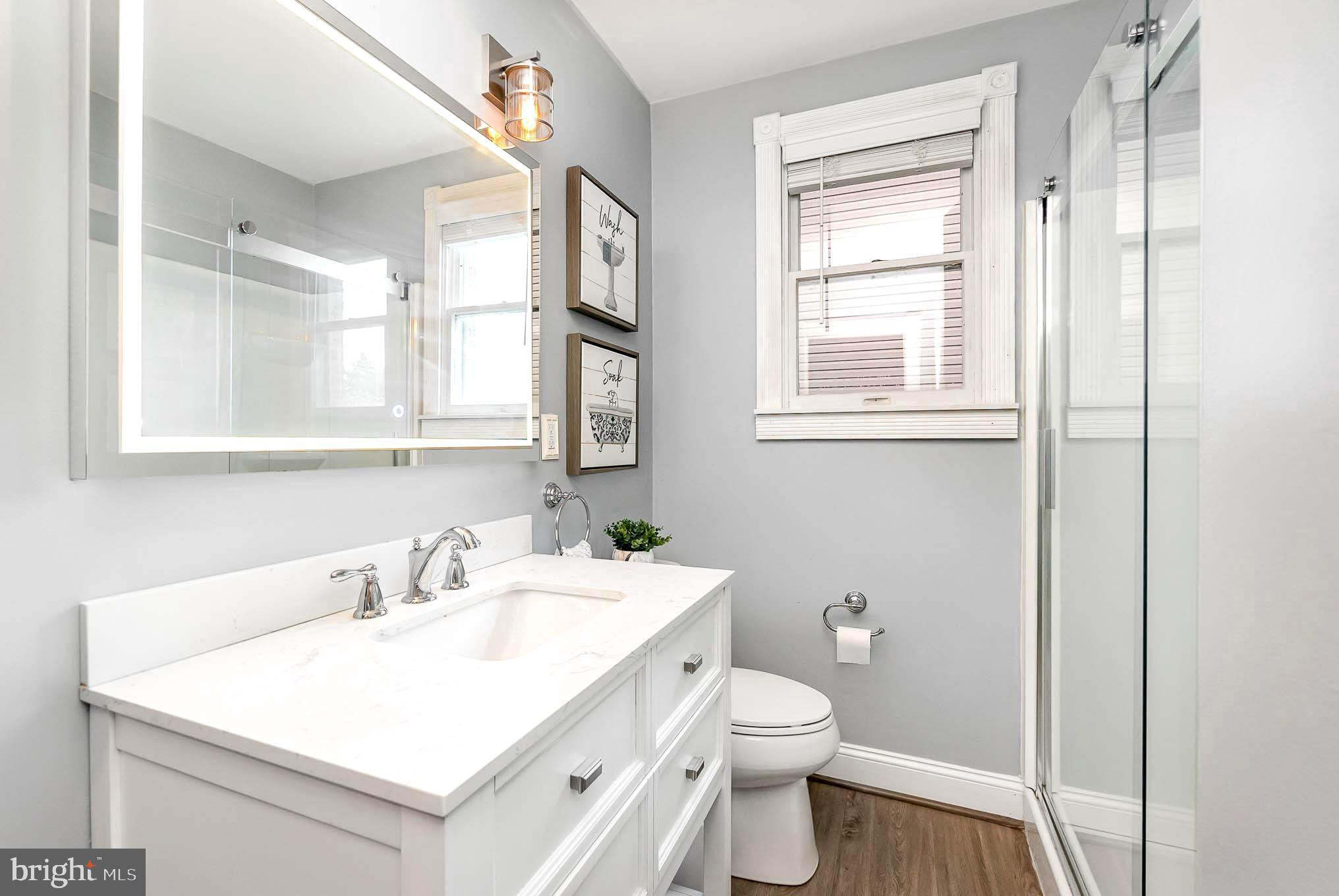 4102 Klausmier Road Baltimore, MD 21236 - Photo 12 of 37 Main level full bath w/ large shower glass doors