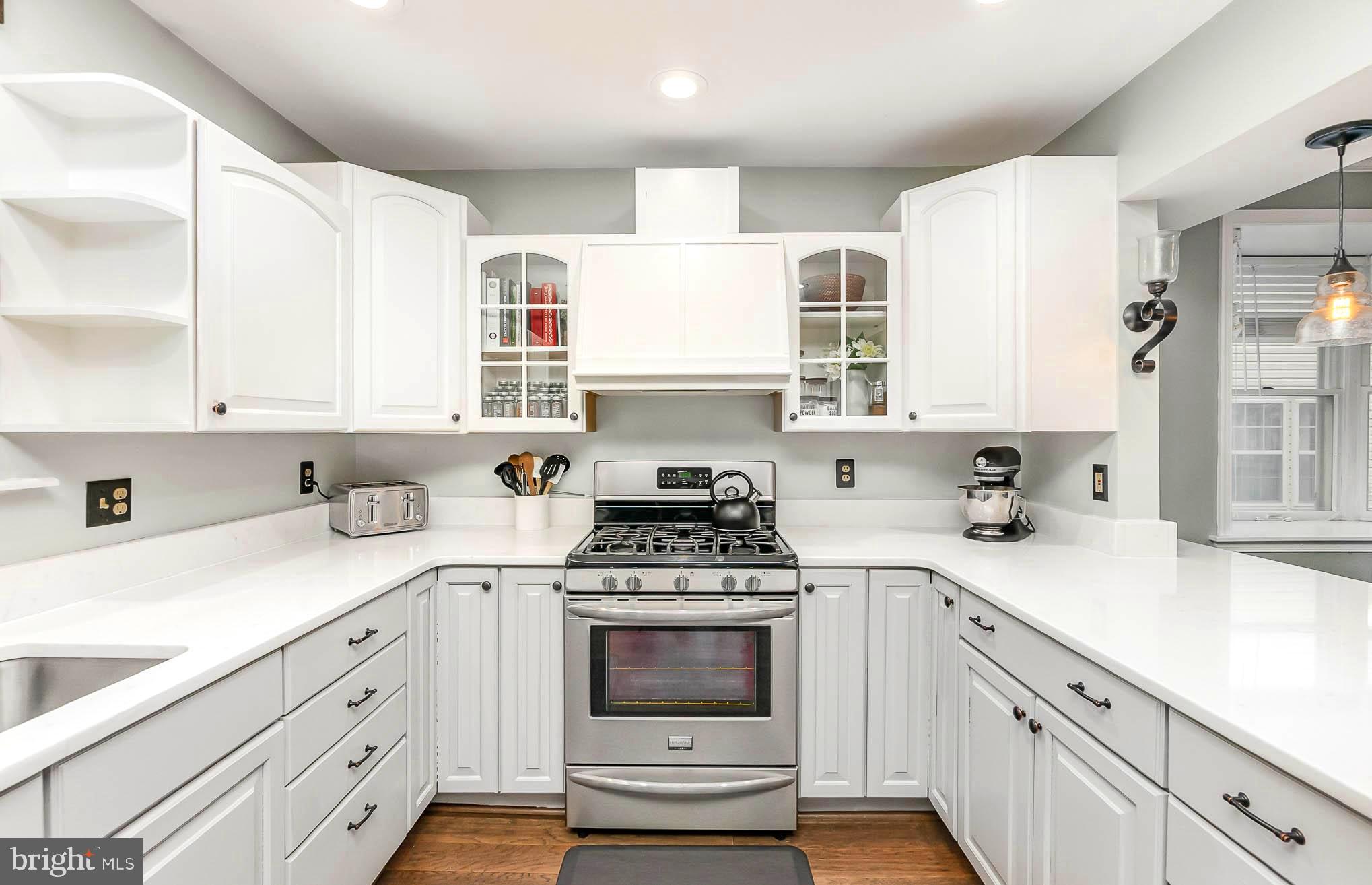 4102 Klausmier Road Baltimore, MD 21236 - Photo 7 of 37 Notice the 2 tone cabinets with glass front accent