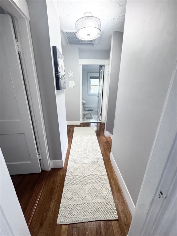 27 Park Saugus Ma Saugus, MA 01906 - Photo 17 of 32 a view of a hallway view with staircase