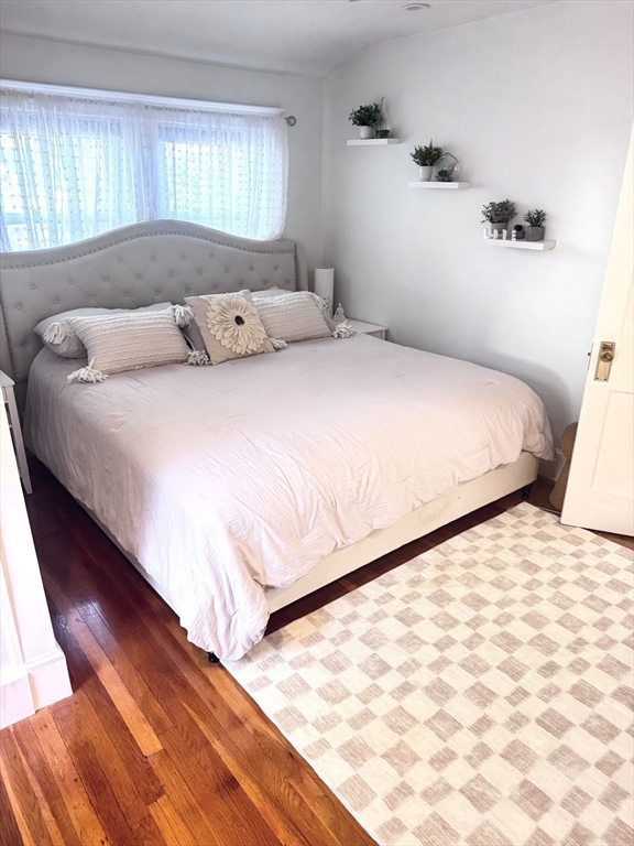 27 Park Saugus Ma Saugus, MA 01906 - Photo 19 of 32 a bedroom with a bed and with wooden floor