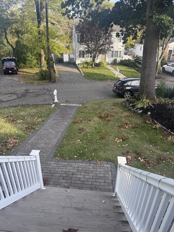27 Park Saugus Ma Saugus, MA 01906 - Photo 2 of 32 a balcony with view of yard