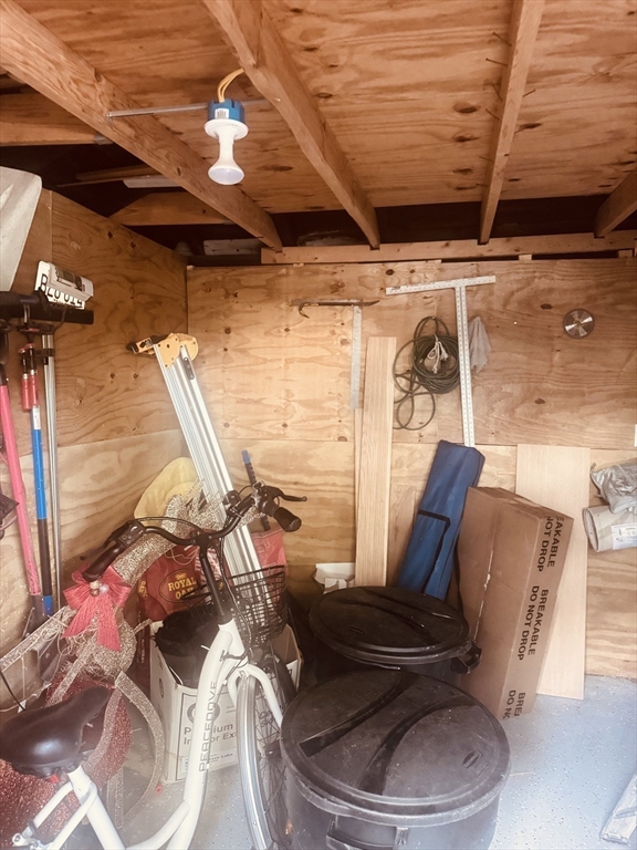 27 Park Saugus Ma Saugus, MA 01906 - Photo 32 of 32 a view of a patio with table and chairs with wooden floor