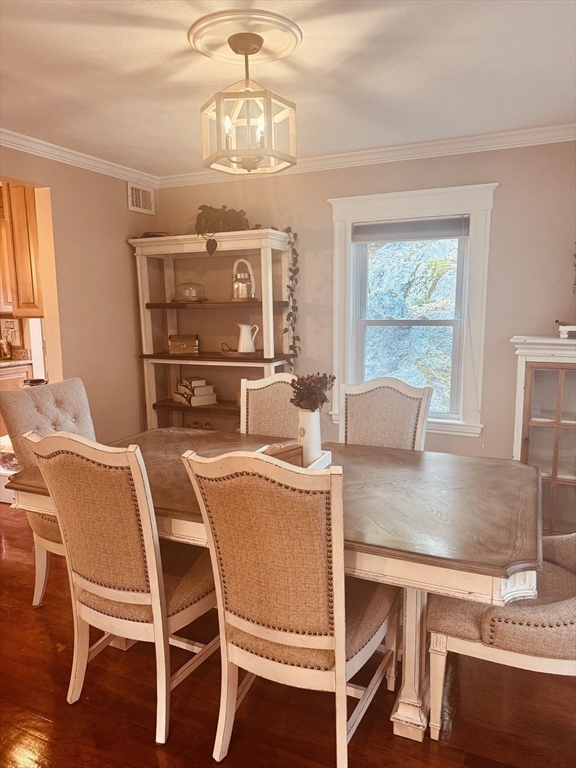 27 Park Saugus Ma Saugus, MA 01906 - Photo 8 of 32 a view of a dining room with furniture and chandelier