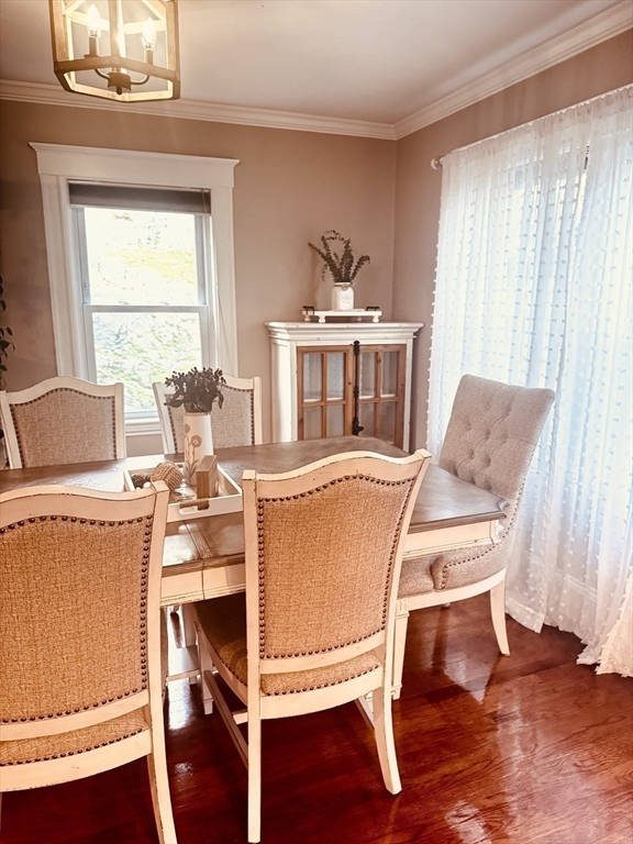 27 Park Saugus Ma Saugus, MA 01906 - Photo 9 of 32 a living room with a couch and a table