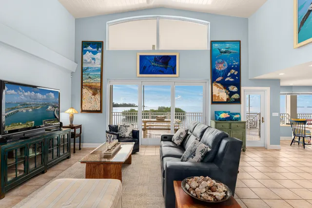 a view of a street with a tree