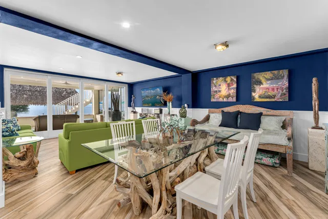 a bedroom with a bed couch and a window