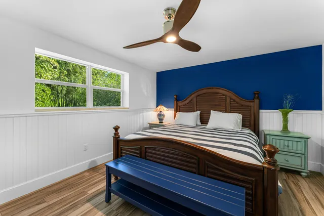 an aerial view of a house with a yard sitting space