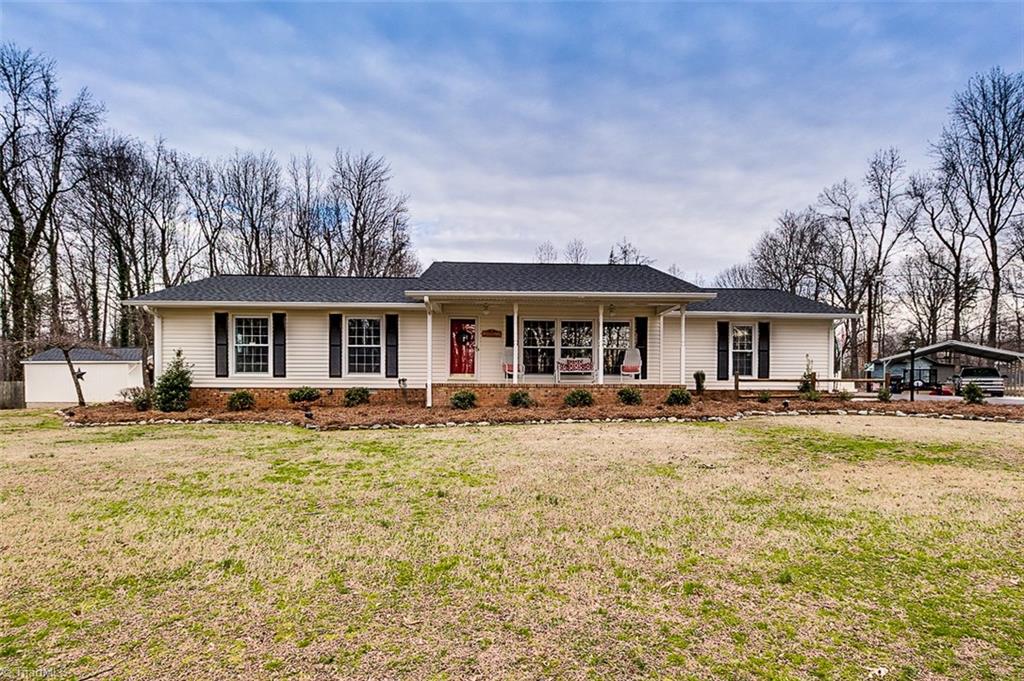 5031 Pliney Farlow Road Trinity, NC 27370 - Photo 1 of 28 Beautiful Rocking Chair Front Porch 3 Bedroom 2 Bath Nicely Updated Ranch Style Home Situated On 1.61 Acres And Offers 2 Car Oversized Attached Garage, 2 Car Detached Garage, Storage Building and Your Very Own "Tiny House"