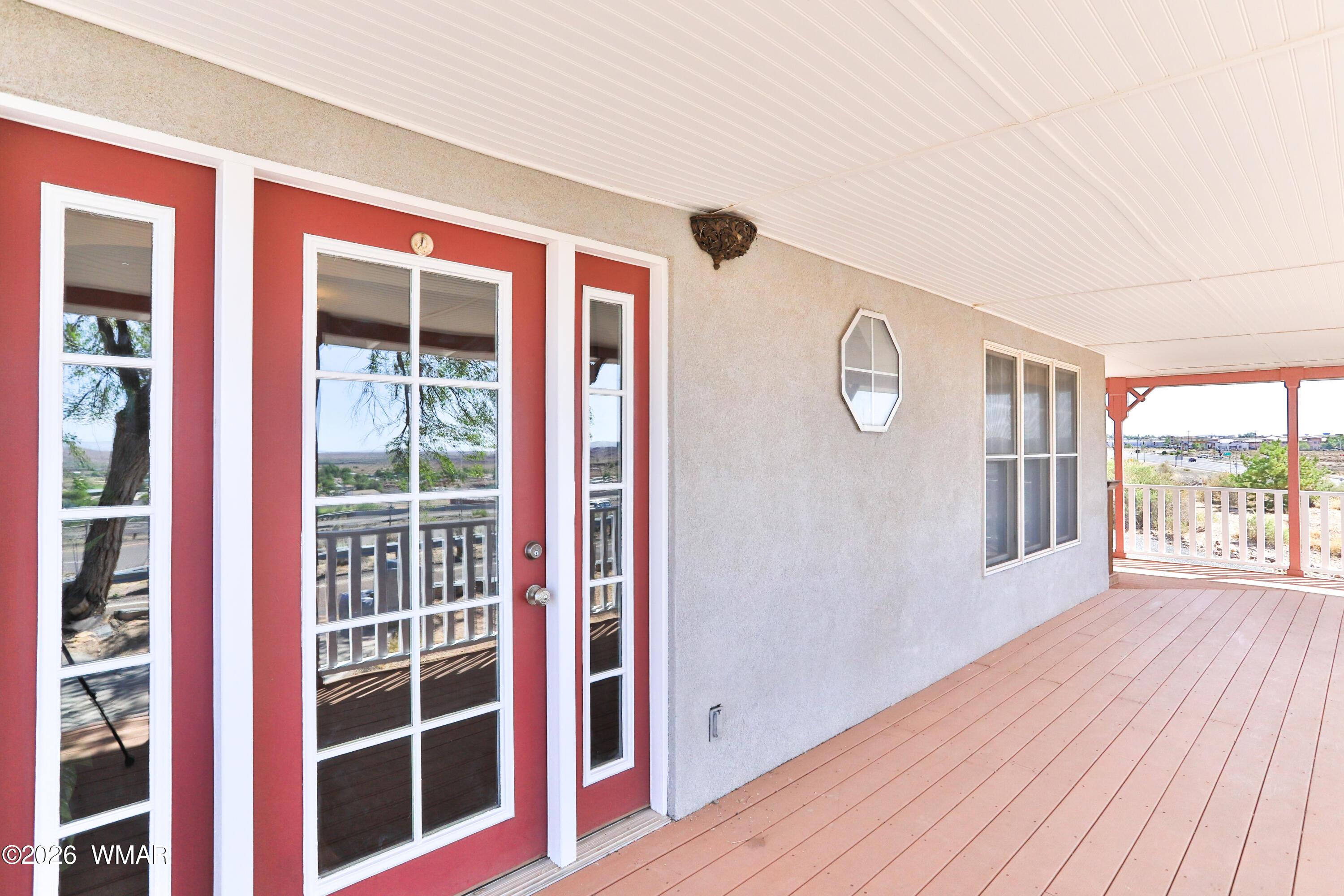 102 Crestview Road Holbrook, AZ 86025 - Photo 43 of 55 a view of wooden floor and windows in the balcony