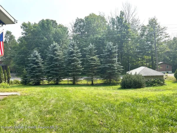 a view of a swimming pool and an outdoor space
