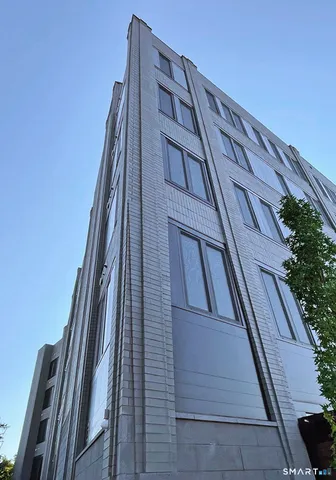 a view of balcony with wooden floor
