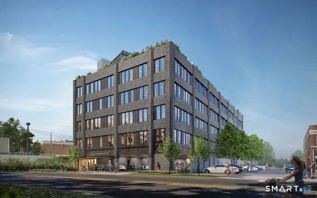 a front view of a building with a street