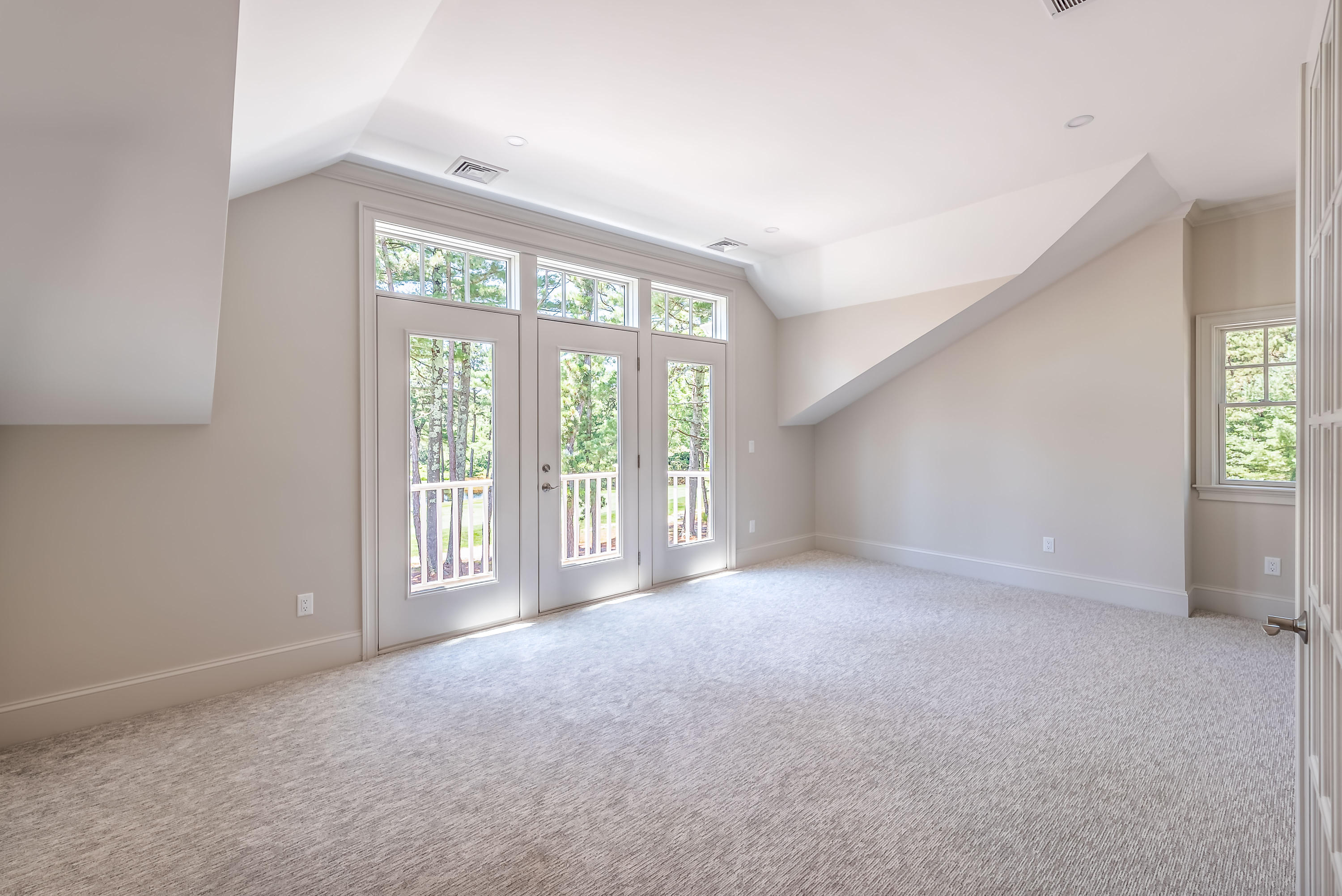 24 Simons Road, Unit B Mashpee, MA 02649 - Photo 11 of 14 a view of an empty room with a window