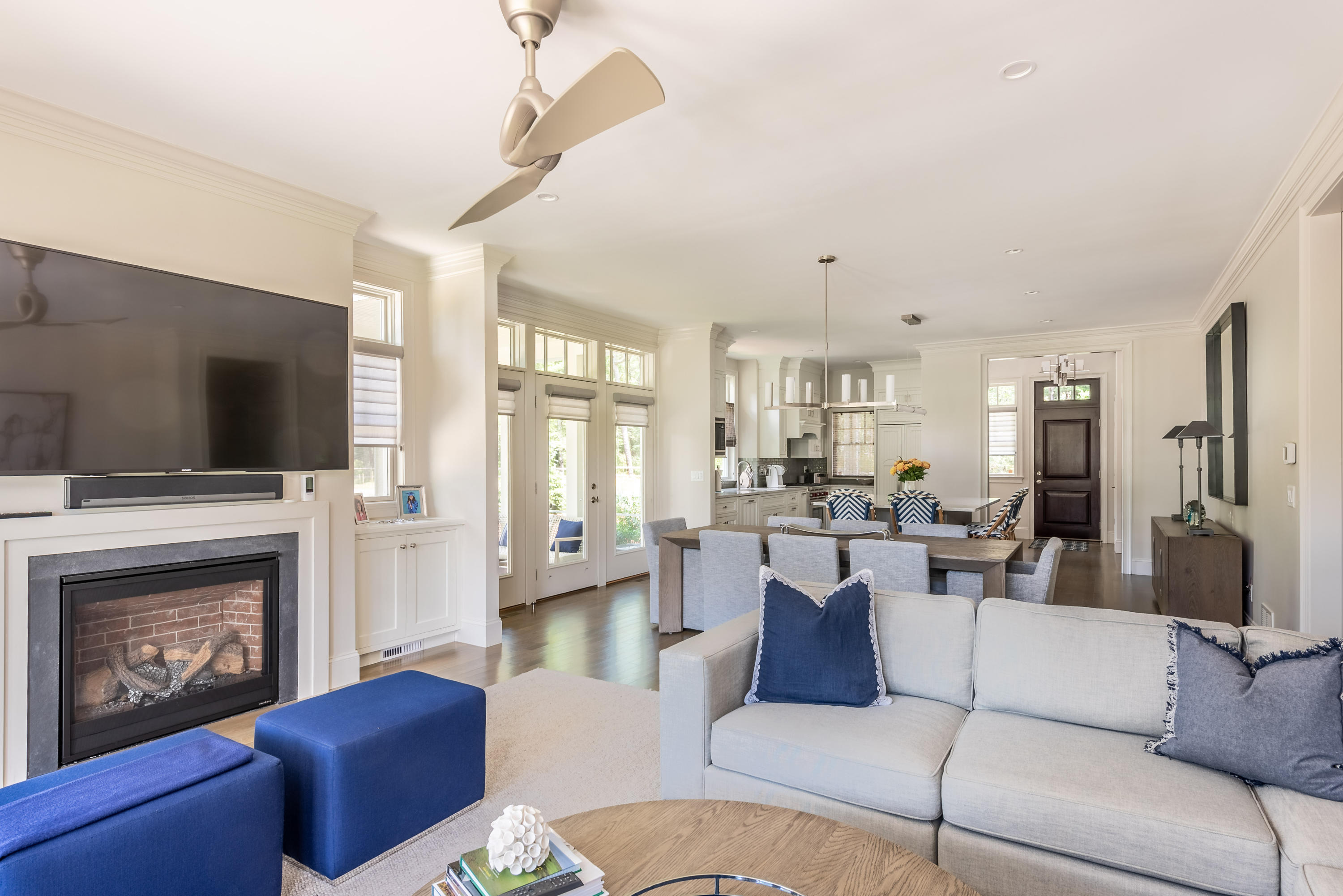 24 Simons Road, Unit B Mashpee, MA 02649 - Photo 4 of 14 a living room with fireplace furniture and a flat screen tv