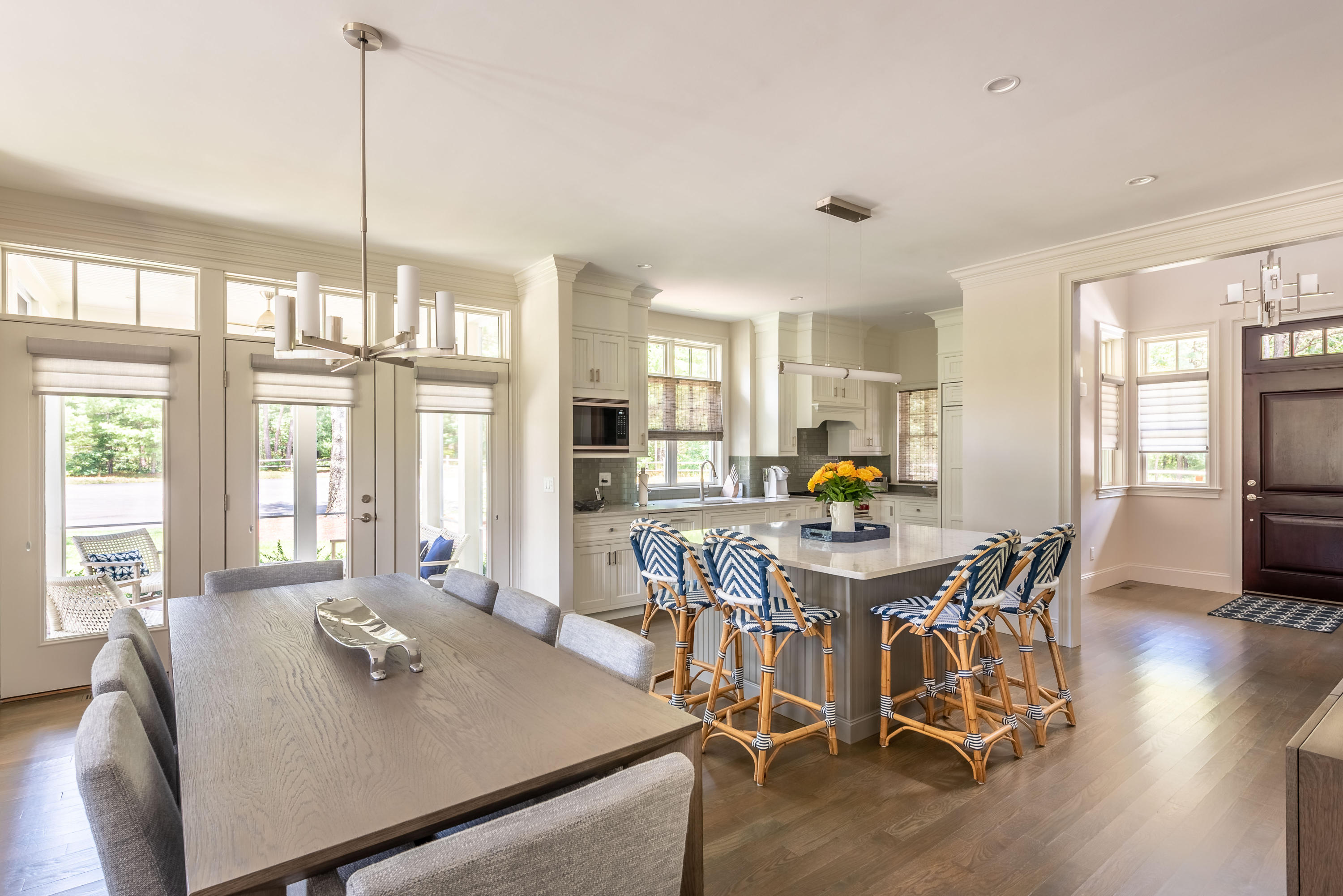 24 Simons Road, Unit B Mashpee, MA 02649 - Photo 6 of 14 a view of a dining room with furniture window and wooden floor