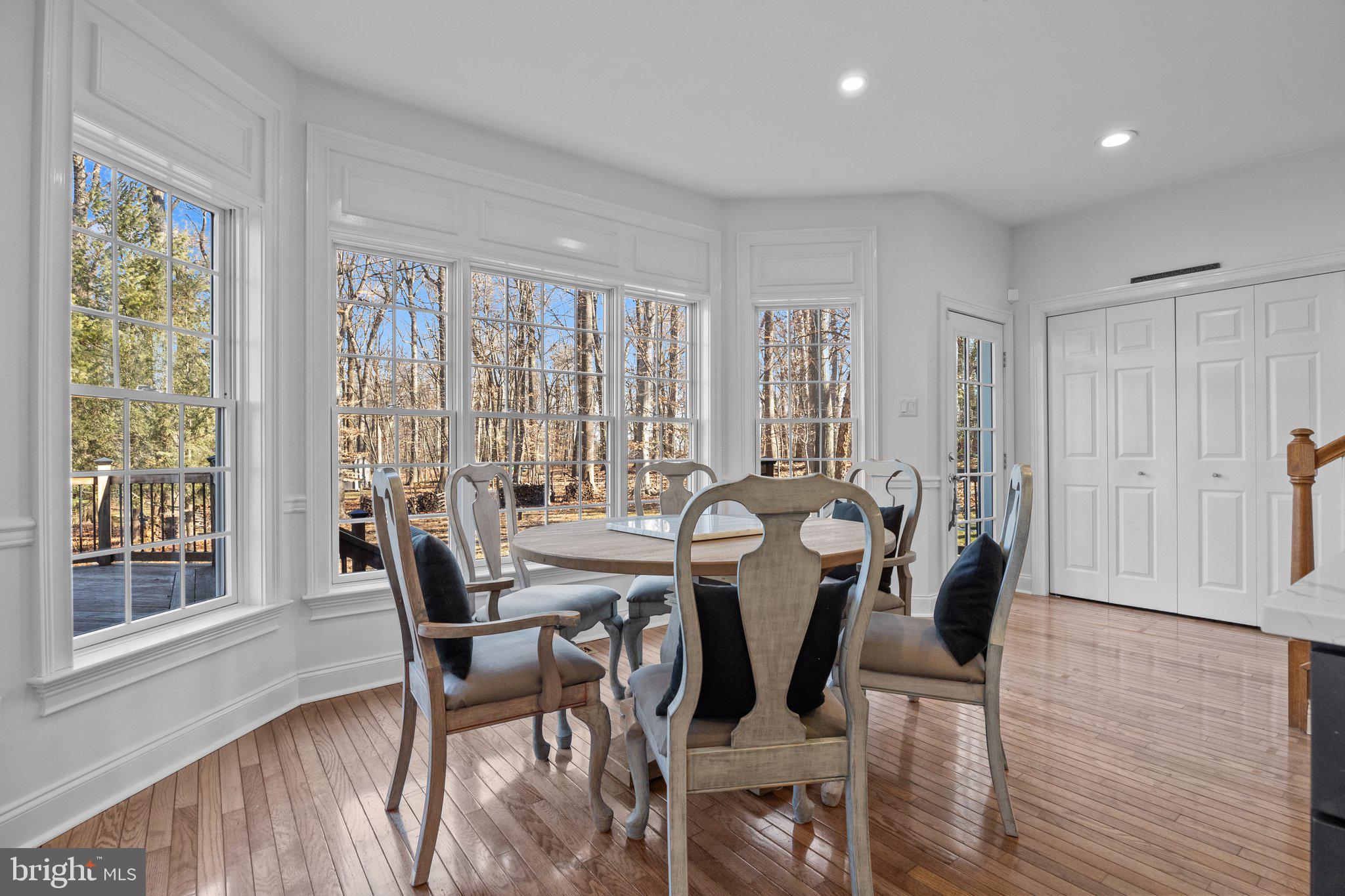 3216 Aquetong Road Doylestown, PA 18902 - Photo 15 of 54 a view of a dining room with furniture and wooden floor