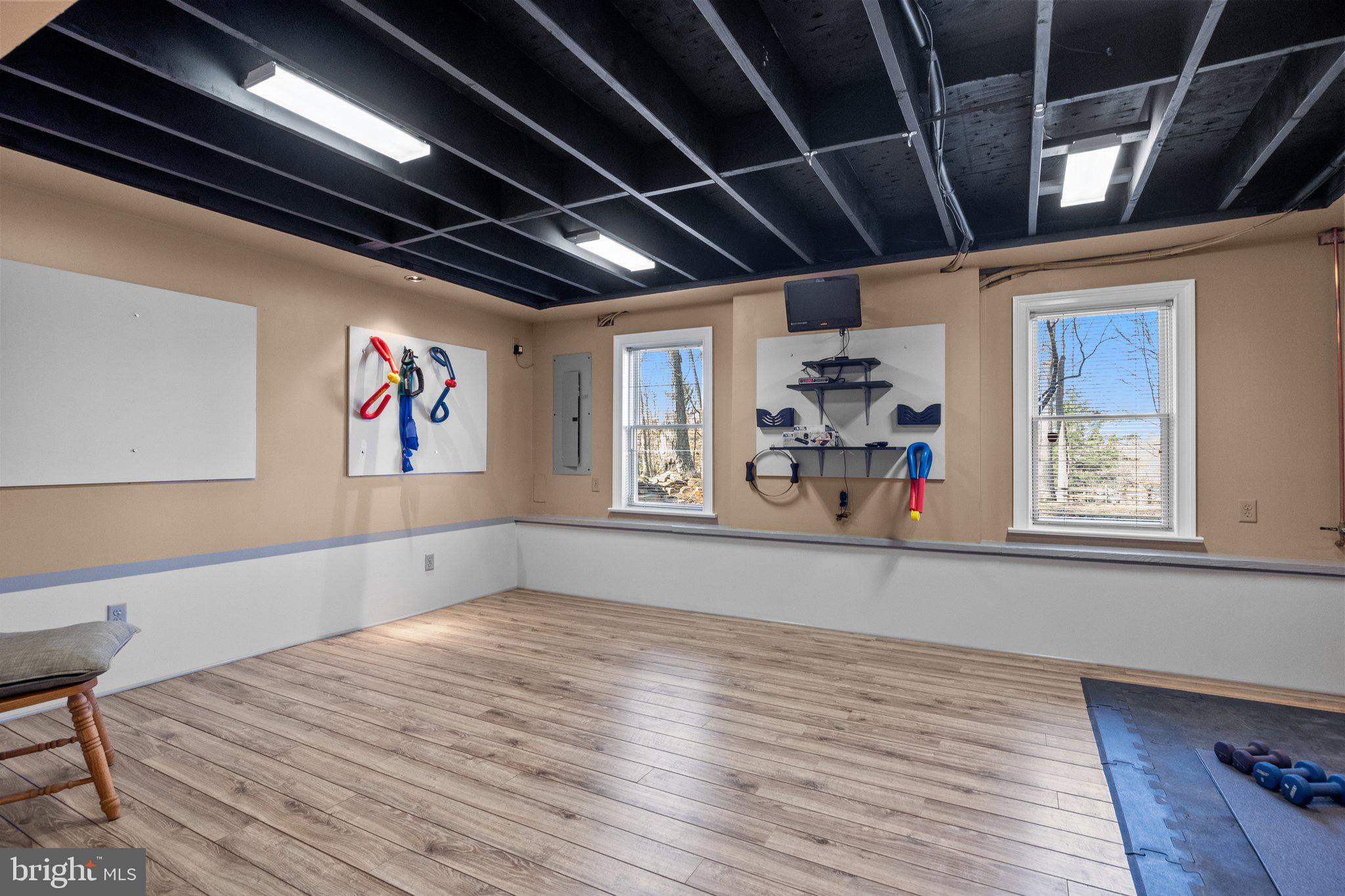 3216 Aquetong Road Doylestown, PA 18902 - Photo 45 of 54 a view of lot of wooden floor and windows in a room