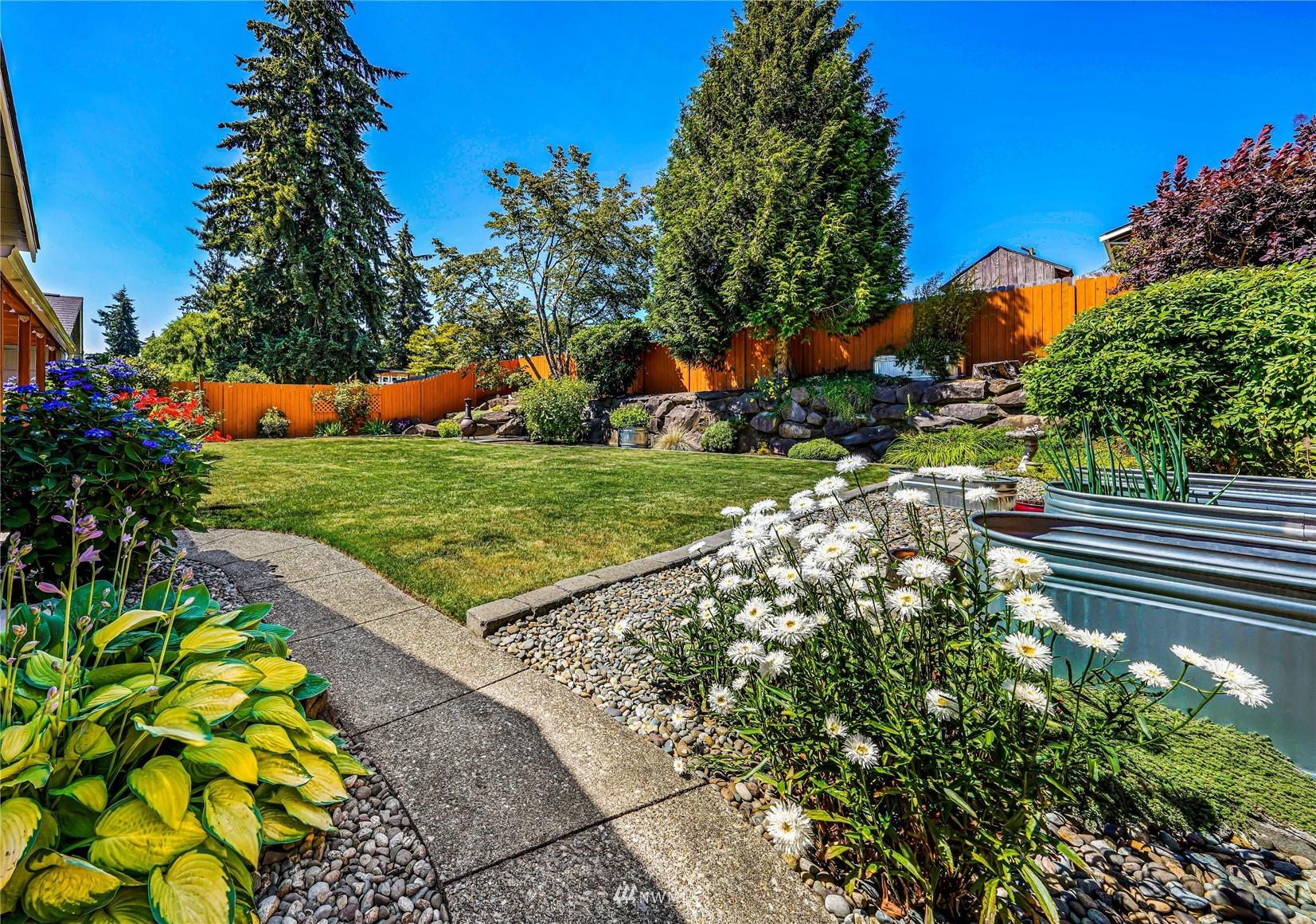 3908 Northeast 22nd Street Renton, WA 98056 - Photo 18 of 32 a view of a garden with an outdoor space