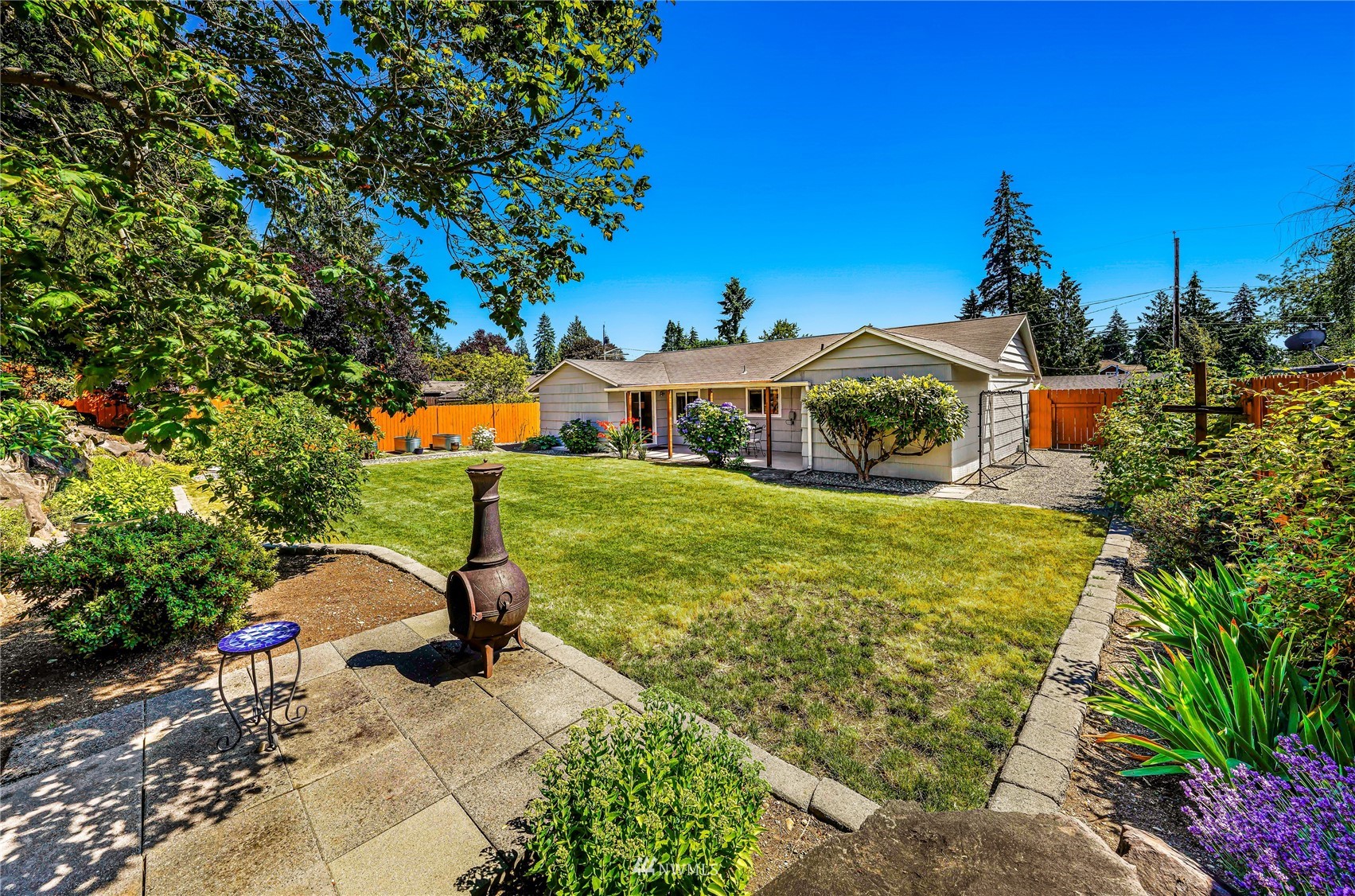 3908 Northeast 22nd Street Renton, WA 98056 - Photo 19 of 32 a front view of a house with garden