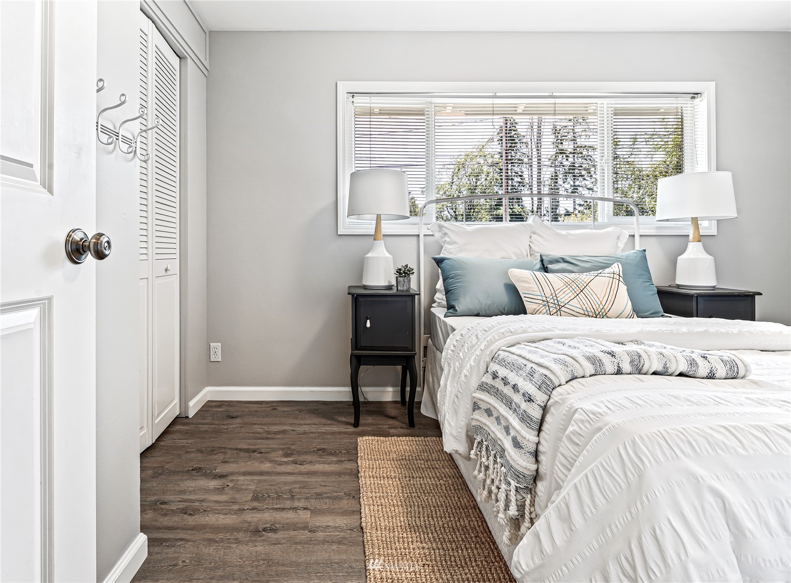 3908 Northeast 22nd Street Renton, WA 98056 - Photo 22 of 32 a bedroom with a bed and a window