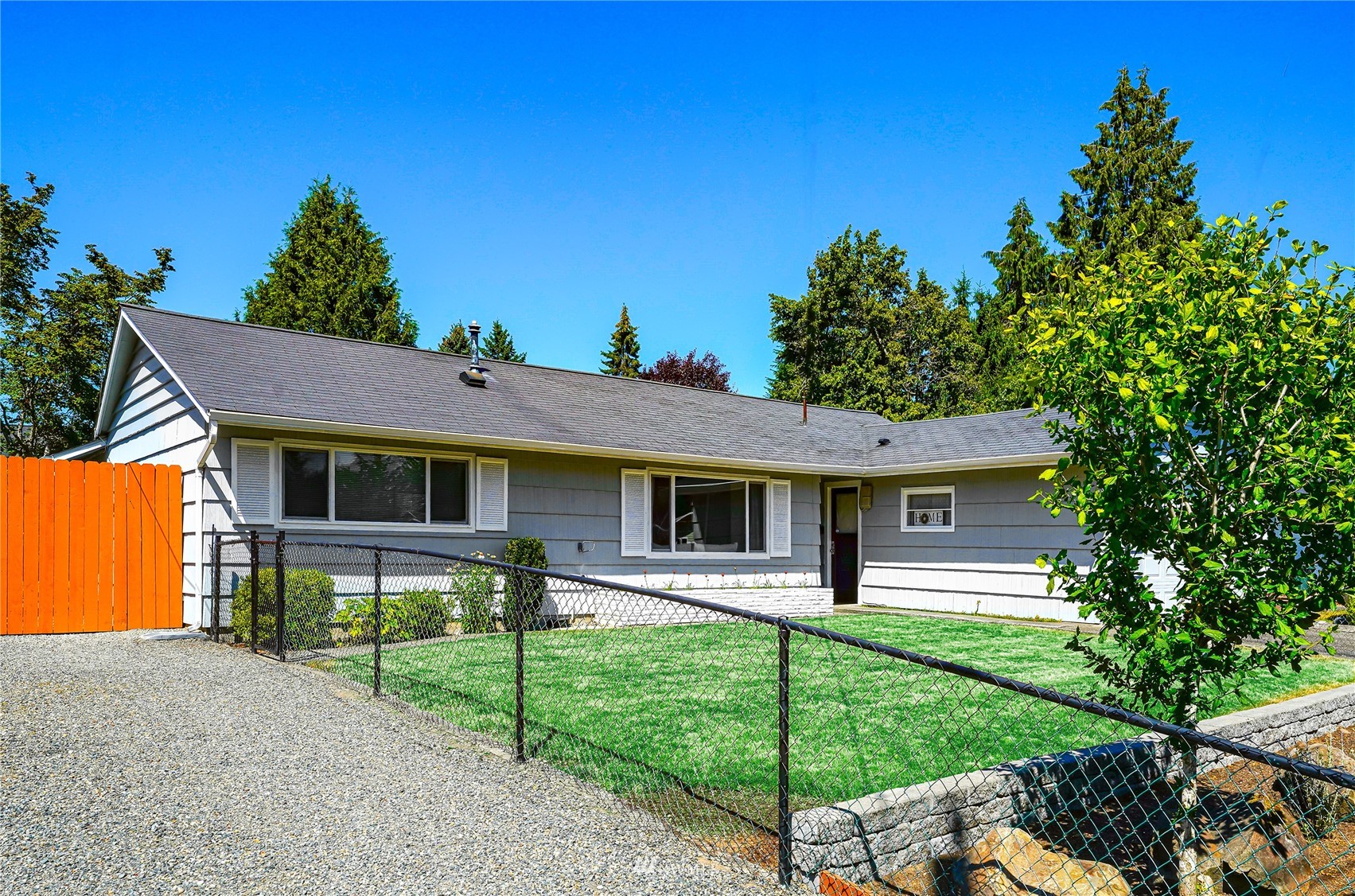 3908 Northeast 22nd Street Renton, WA 98056 - Photo 32 of 32 a view of a house with a yard