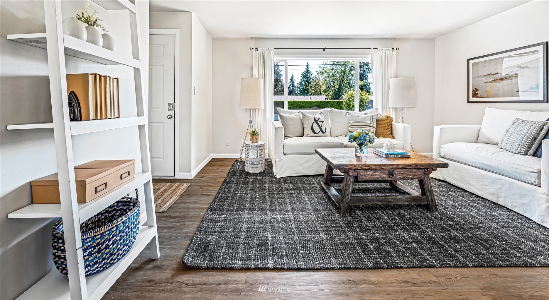 3908 Northeast 22nd Street Renton, WA 98056 - Photo 5 of 32 a living room with furniture and a rug