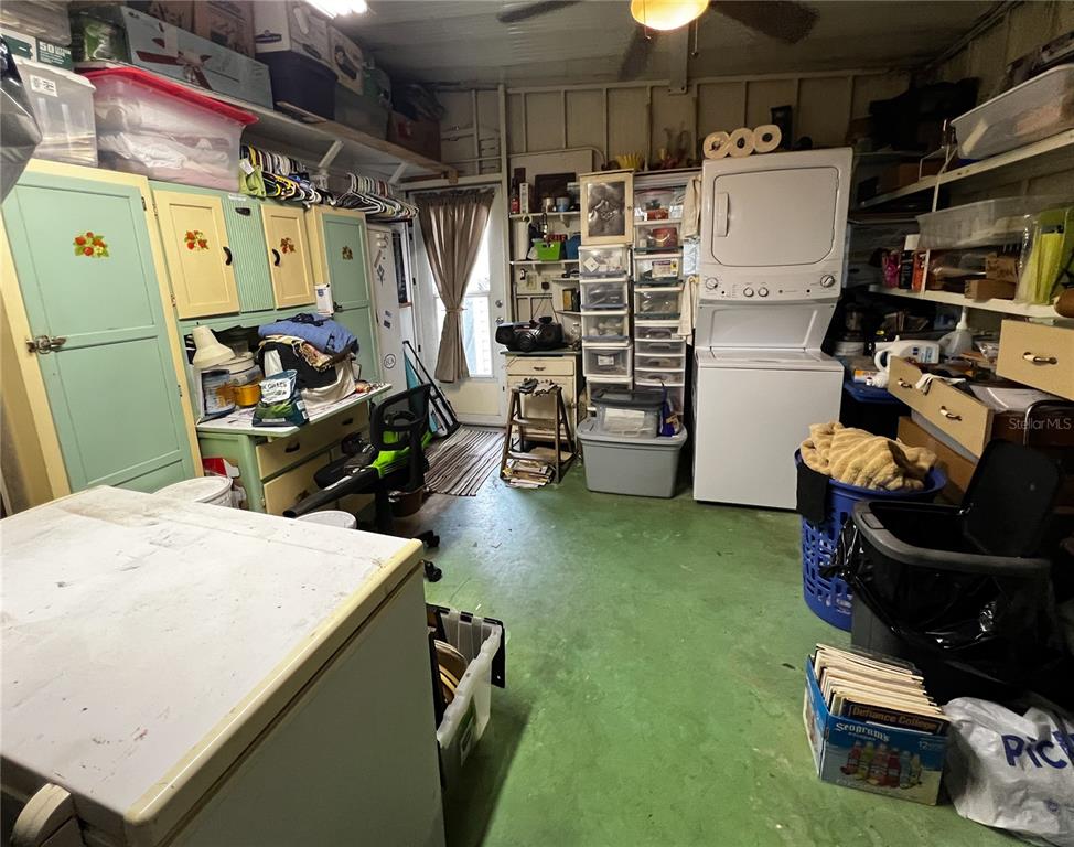 34543 Rosebud Row Zephyrhills, FL 33541 - Photo 23 of 41 a utility room with dryer and washer