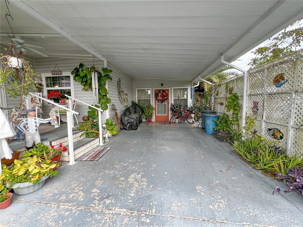 34543 Rosebud Row Zephyrhills, FL 33541 - Photo 30 of 41 a view of a room with gym equipment