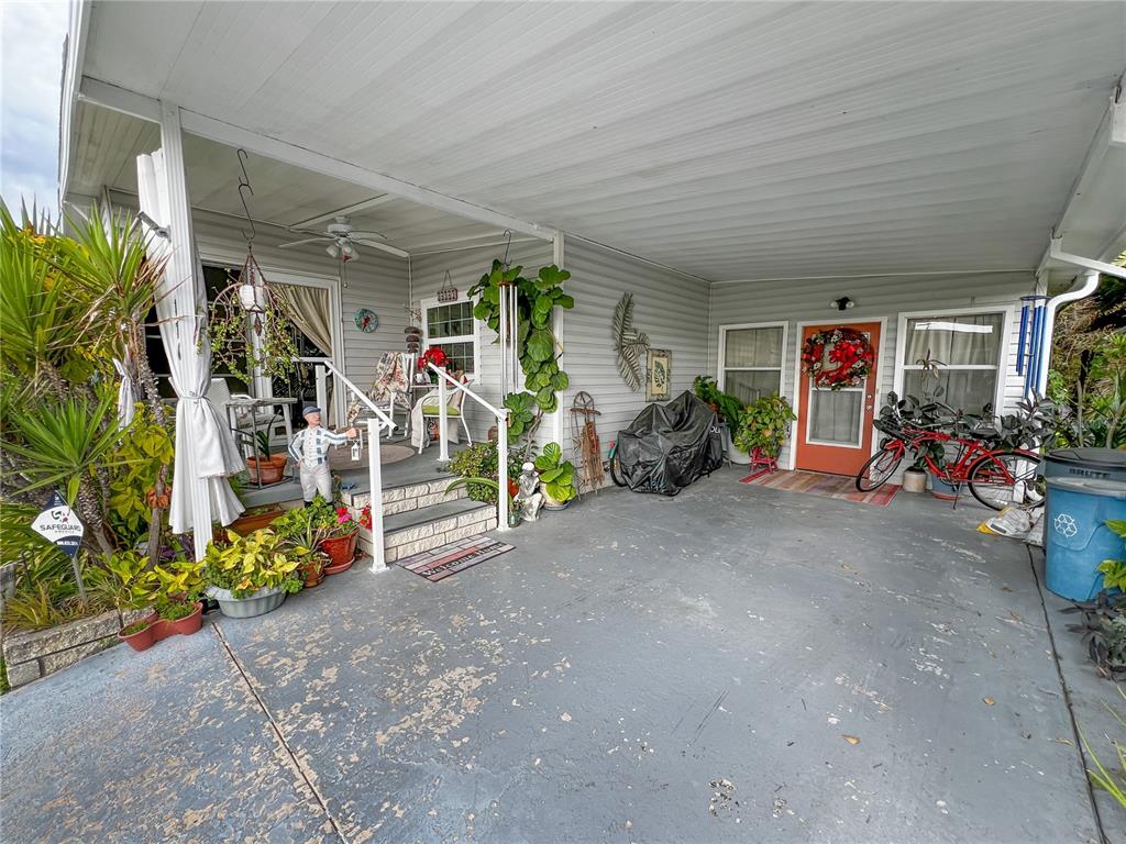 34543 Rosebud Row Zephyrhills, FL 33541 - Photo 31 of 41 a view of a room with gym equipment