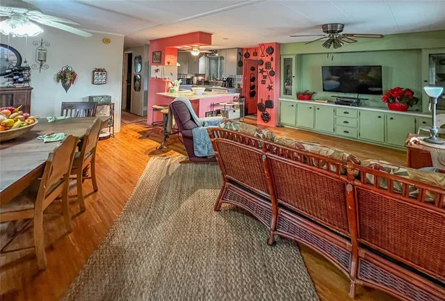 a view of a living room and dining room
