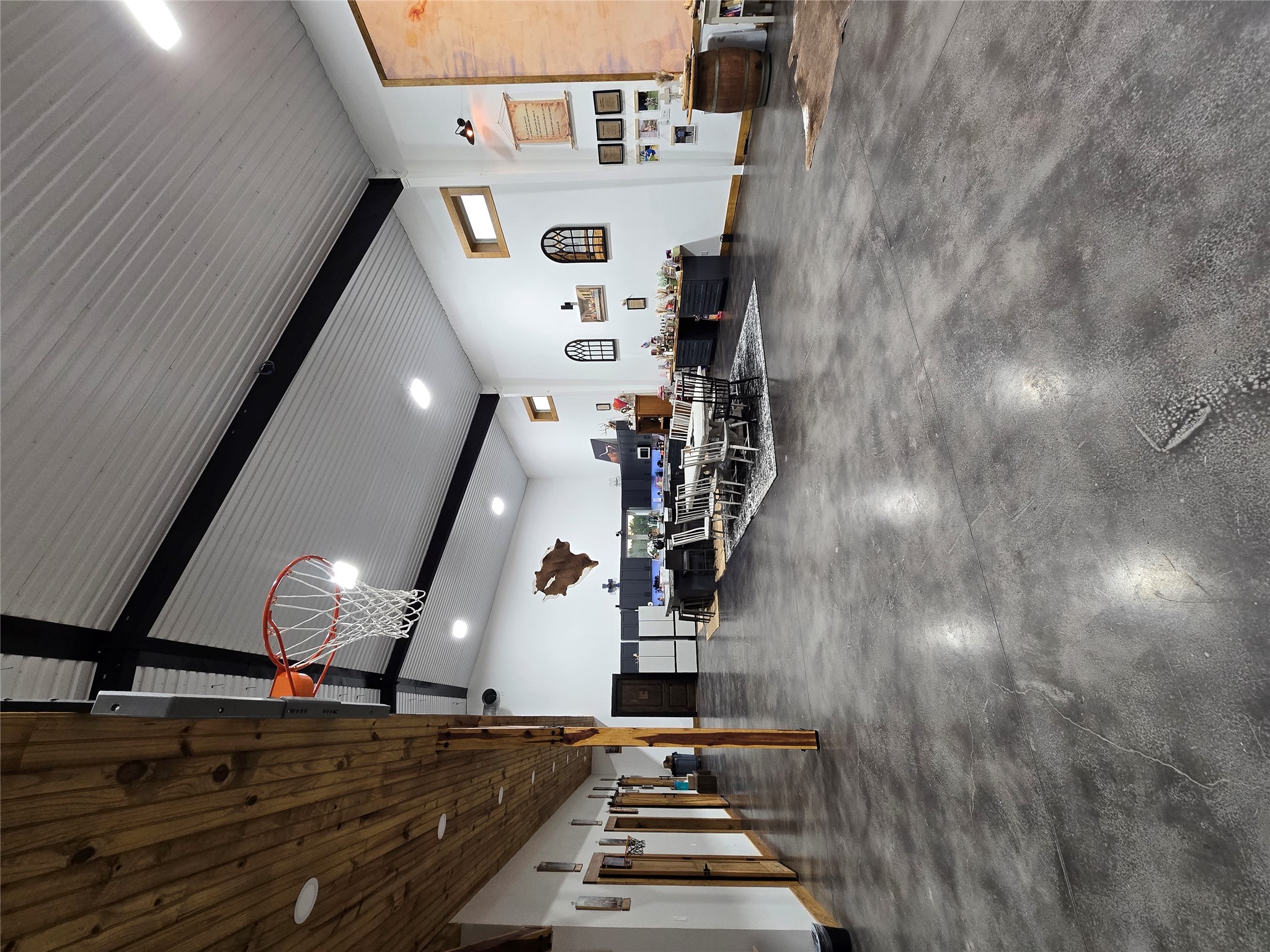 143 County Road Paige, TX 78659 - Photo 4 of 36 Garage featuring baseboards and recessed lighting