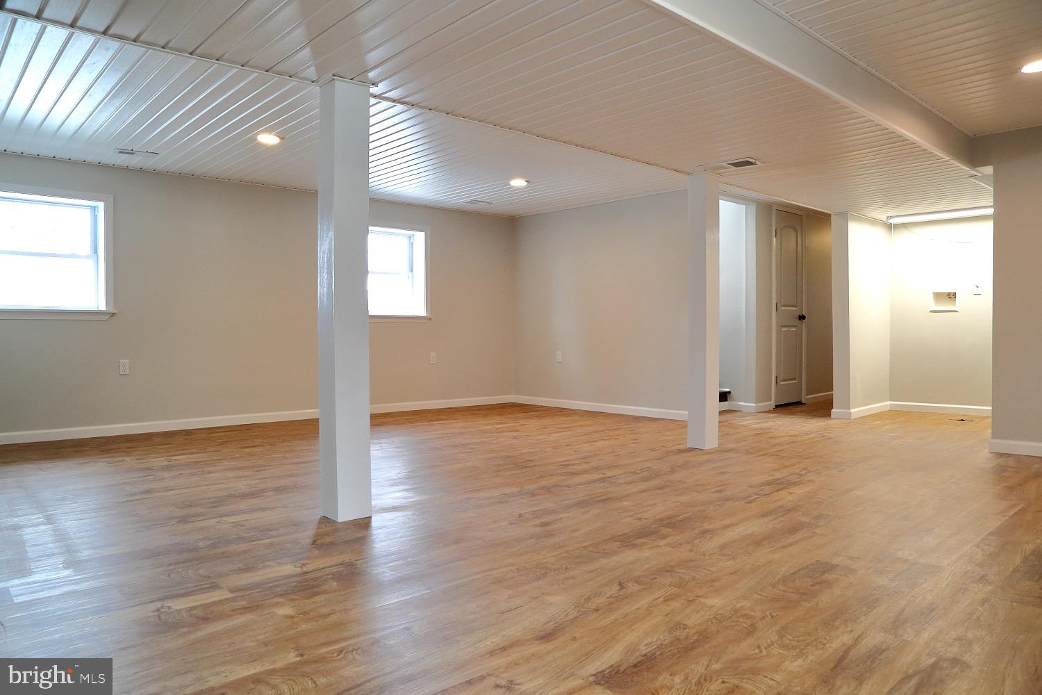 195 Kirks Mill Road Nottingham, PA 19362 - Photo 17 of 22 Family room view towards LR and half bath